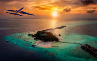 an-airplane-approaching-a-tropical-paradise-island-in-the-maldives